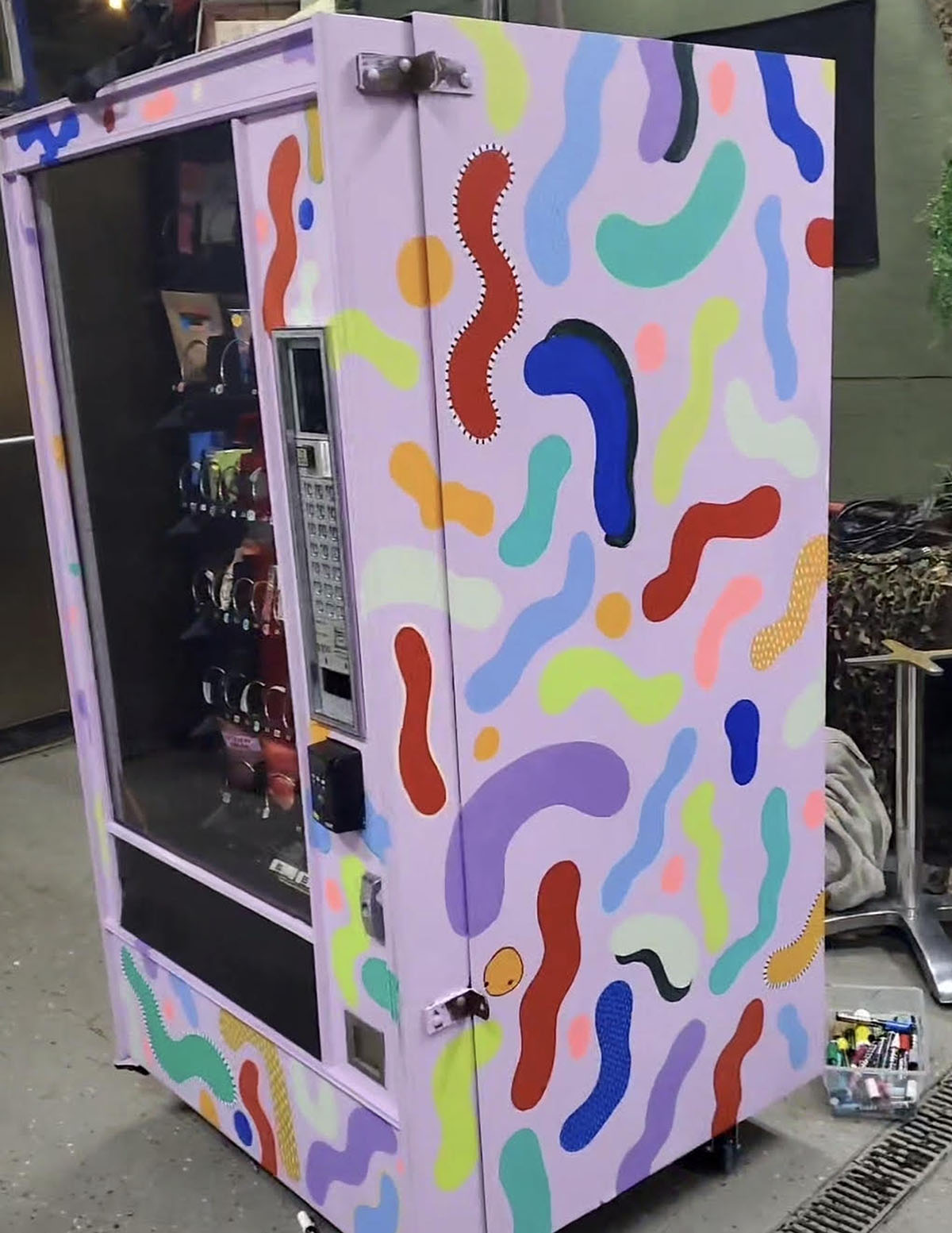 Cold Lunch machine exterior with hand-painted squiggles